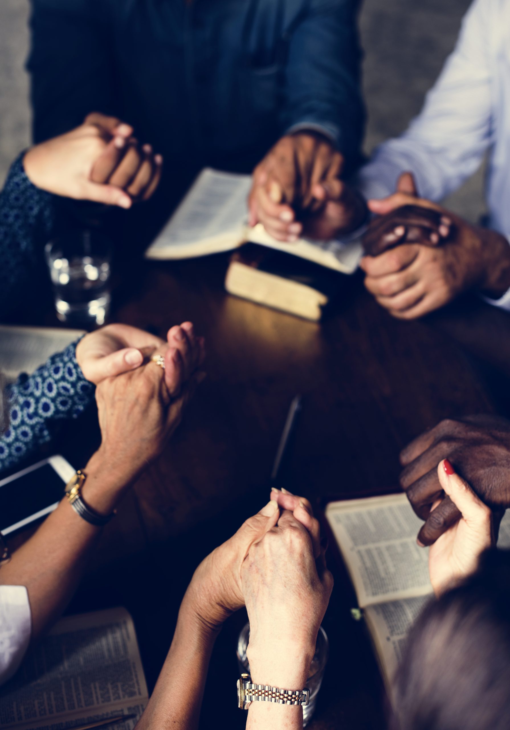 Group of people praying worship believe hope